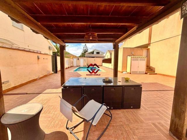 Chalet en venta en San Javier, San Javier. Exclusiva villa de lujo con gran parcela, piscina privada y jardín en Santiago de la Ribera. Chalets San.