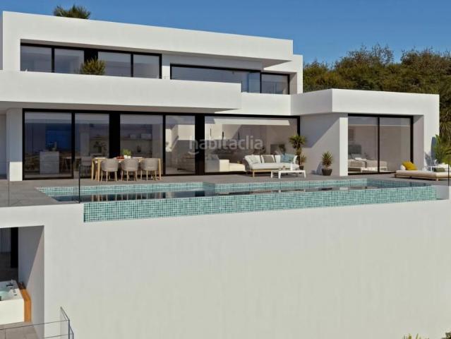 Chalet en venta en Poble Nou de Benitatxell el, Cumbre del Sol. Villa de 4 dormitorios y 5 baños con piscina y terraza, a 500 m de la playa en Benitachell. Chalets Poble Nou de Benitatxell.
