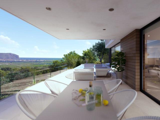 Chalet en venta en Xàbia, Partida Comunes Adsubia. Villa moderna con vistas al mar en Jávea. Chalets.