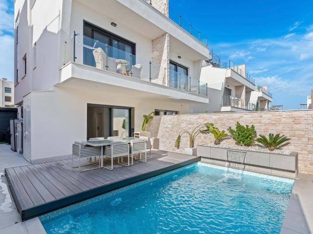 CHALETS ADOSADOS DE OBRA NUEVA EN GUARDAMAR DEL SEGURA