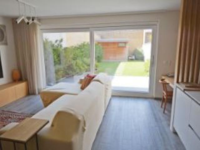 Charmant recent gelijkvloers appartement met tuin, centraal
