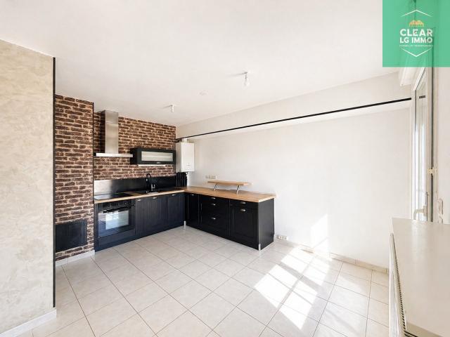 Charmantapt avec balcon et garage
