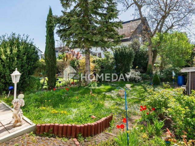 Charmante 3 Zimmer Wohnung mit traumhaftem Garten in Mainz Laubenheim