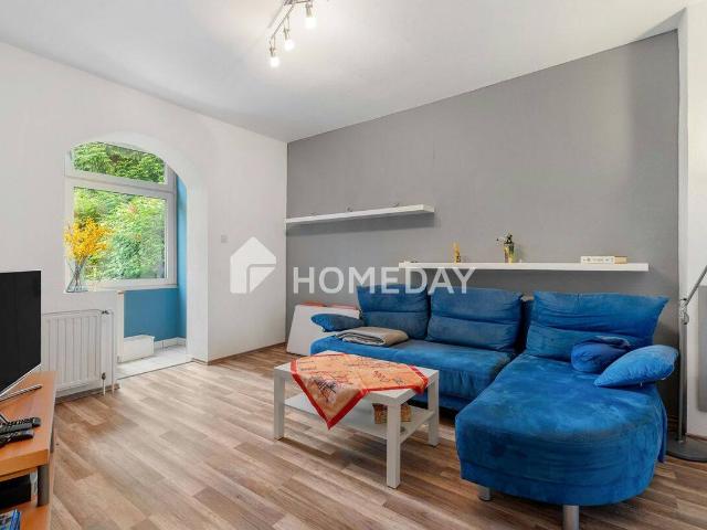 Charmante 2 Zimmer Wohnung mit Gartenblick in gepflegtem Mehrfamilienhaus