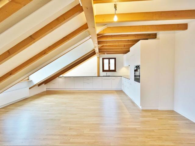 Charmante Dachgeschosswohnung mit Gartenanteil