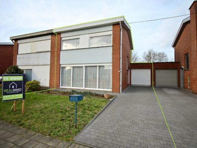 Charmante en gunstig gelegen woning met tuin en garage !