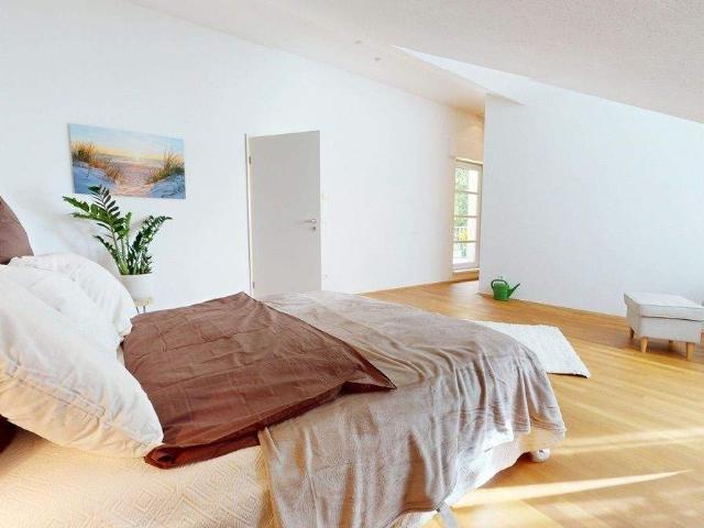 Charmante Eigentumswohnung mit Terrasse, Ankleideraum und Garage