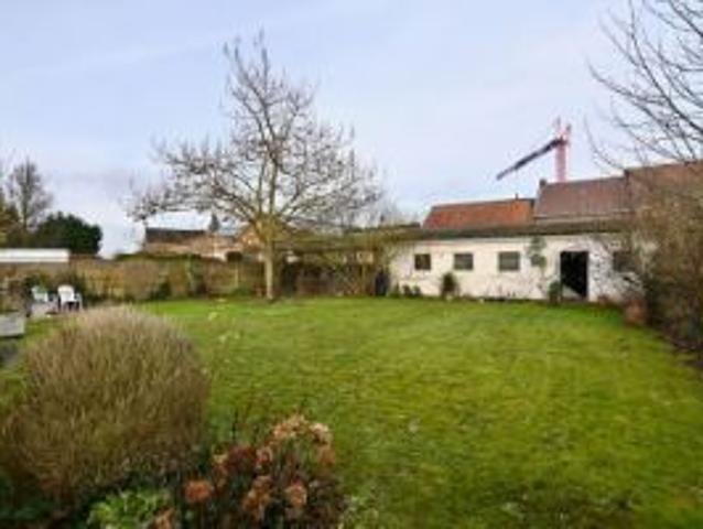 Charmante hoevewoning op 9a90ca met stalling en poorthuis.