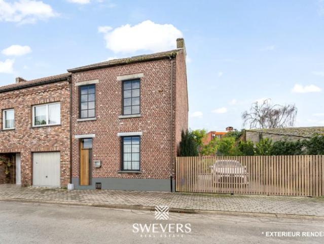 Charmante halfopen woning met renovatiepotentieel in Sint T