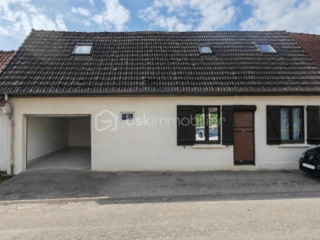 Charmante maison mitoyenne