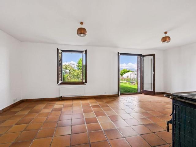 Charmante maison avec jardin dans un cadre verdoyant
