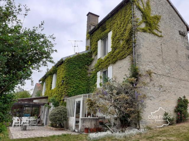 Charmante maison de village avec vérandas, garage double et