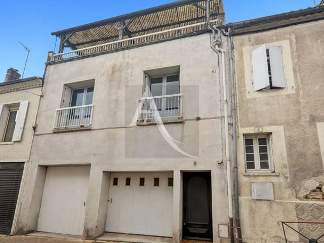 Charmante maison de ville avec garage et terrasse