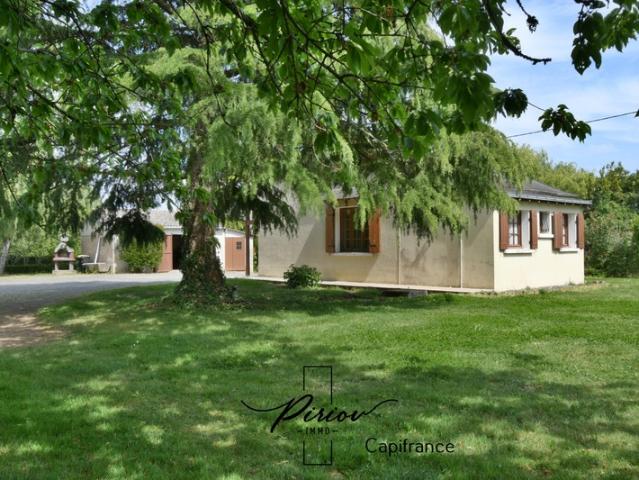 Charmante maison, environnement verdoyant avec 5925 m² de terrain arboré