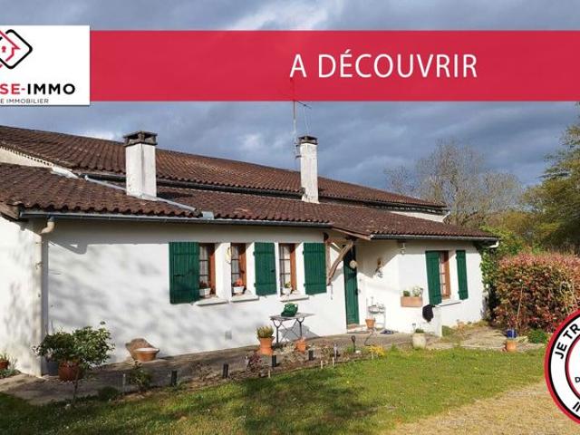 Charmante Maison Familiale de 6 Pièces avec Vaste Jardin Arboré et Garage à Monestier