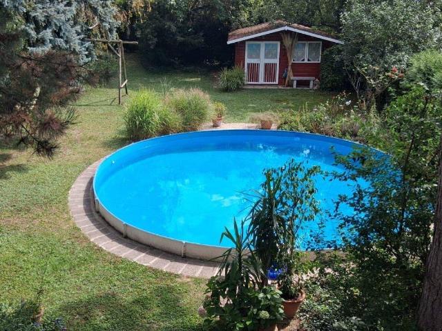 Charmantes Einfamilienhaus in Bestlage von Wien Mauer – mit Pool, Garten und viel Privatsphäre | ZΞLLMANN IMMOBILIEN