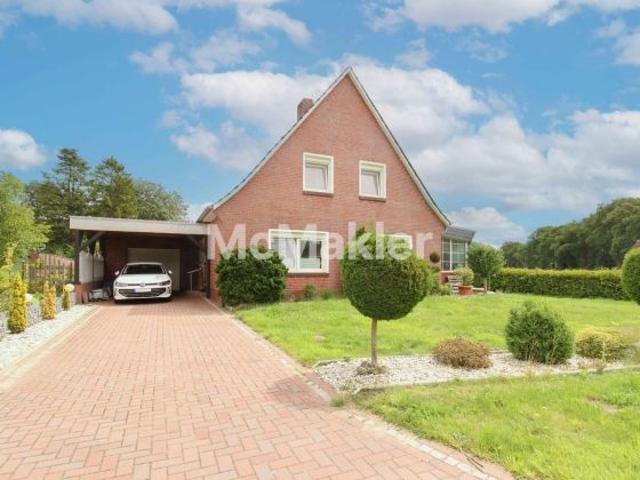 Charmantes Einfamilienhaus mit Garten, Garage und Carportstellplatz in Großefehn