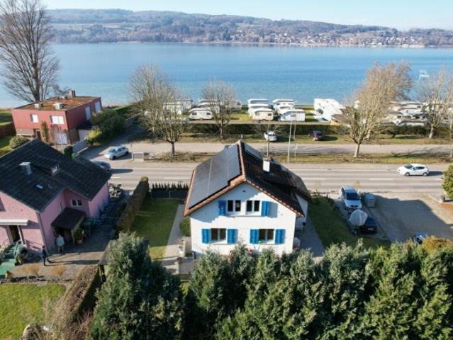 Charmantes Einfamilienhaus mit grossem Garten und Seesicht je nach Jahreszeit