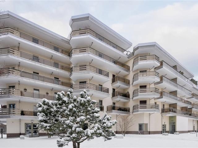 Charmantes 2 Zimmer Apartment mit Garten und Seeblick