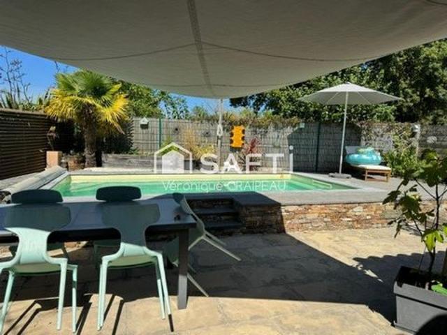 Charme, authenticité pour cette jolie maison familiale de 107m² hab avec 3 chambres, extérieur et piscine en village