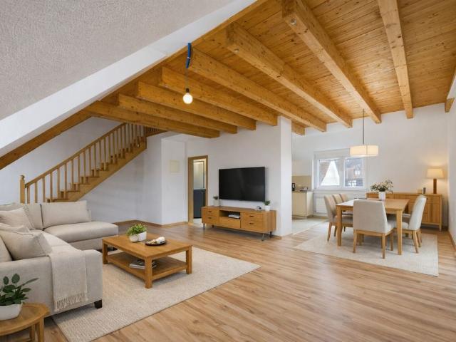 Charming 3.5 room penthouse apartment with gallery in Steckborn – Centrally located with garden and parking space