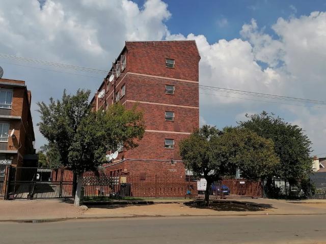 Charming Bachelor flat for sale in Pretoria West, offering modern living in a convenient location