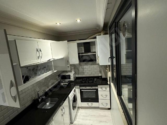 Cihangirde yeni binada full Eşyalı giriş altı 1+1 daire