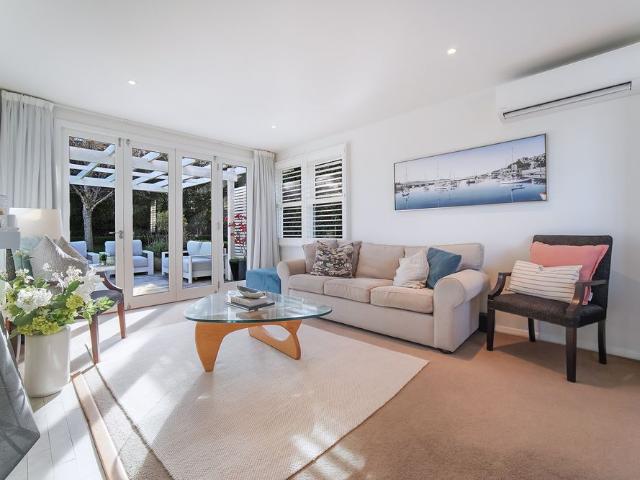 Comfort and Style in Beautiful Garden Setting!