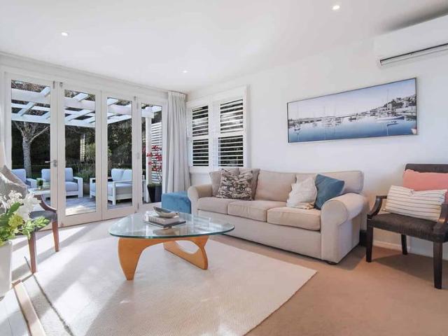 Comfort and Style in Beautiful Garden Setting!
