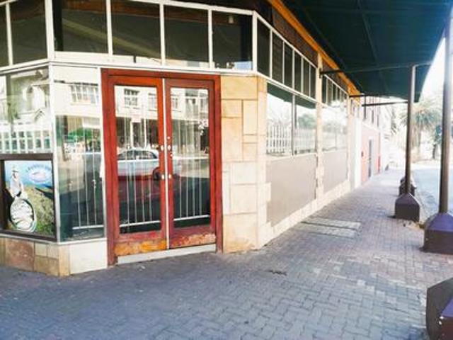 commercial property 3 flats, shops.