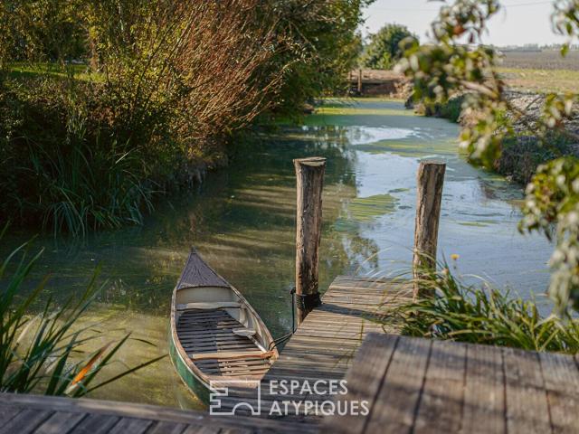 Contemporaine bucolique et son gîte en bord de Venise Verte
