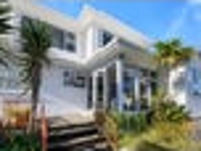 CONTEMPORARY COASTAL LUXURY, ELEVATED WITH VIEWS