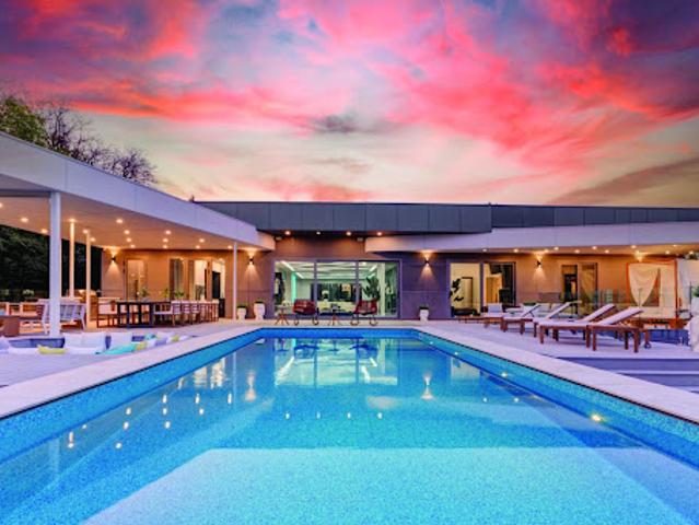 Contemporary house with pool and garden