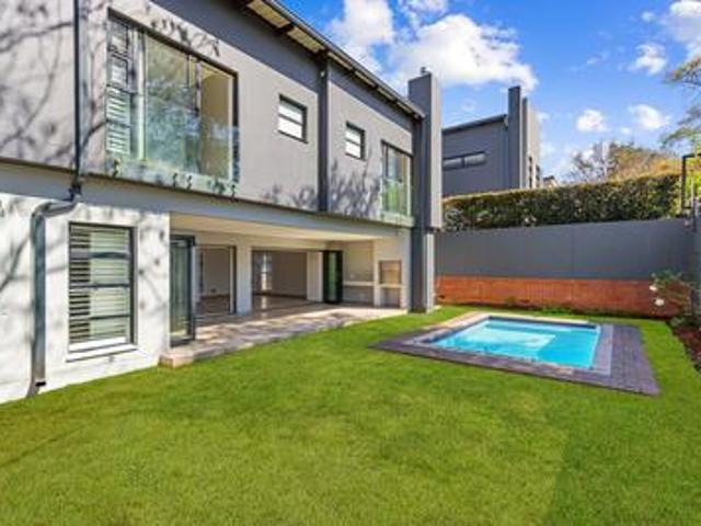 contemporary luxury in a secure brya.