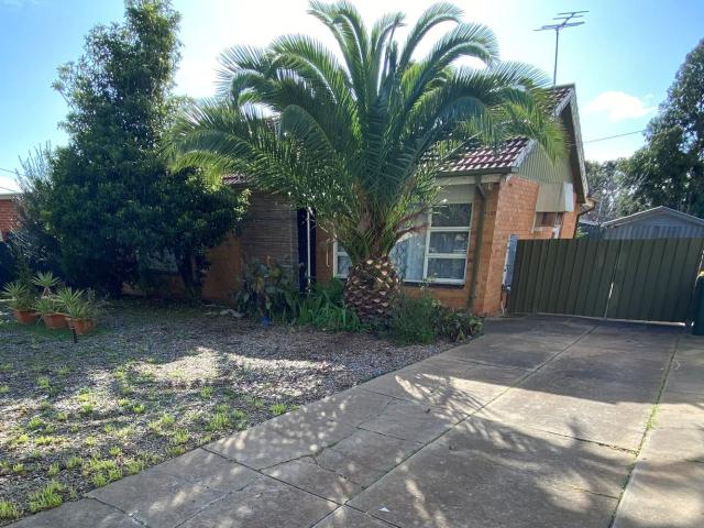 Convenient Family Living with Large Yard & Shed