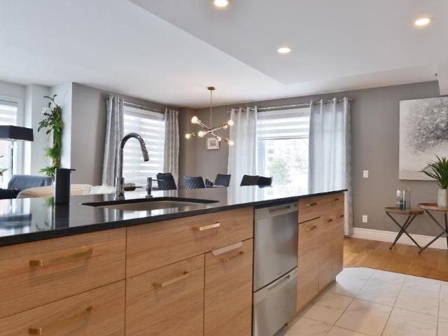 Condo Vue sur le Golf de la Faune / stationnement intérieur