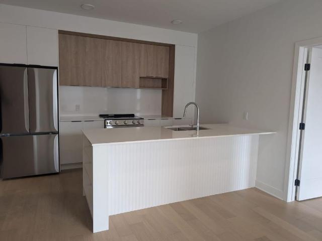 ✨ CONDO NEUF HAUT DE GAMME | 964 pi² | STATIONNEMENTS INTÉRIEURS | GYM • PISCINE • TERRASSE SUR LE TOIT | OTTERBURN PARK ✨
