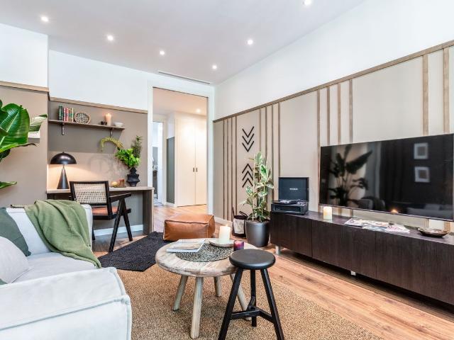 Congolese Inspired 3 Bedroom Apartment with Jungle Bliss and Dual Workspaces in Salamanca, Madrid Amsterdam Apartments for Rent