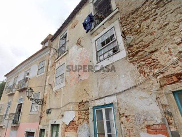 Conjunto de 3 Prédios no Castelo S. Jorge | Wallis Real Estate