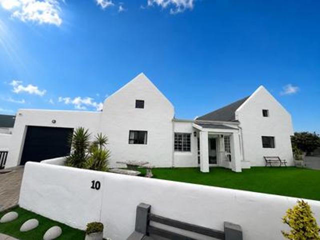 coastal home with separate entertain.