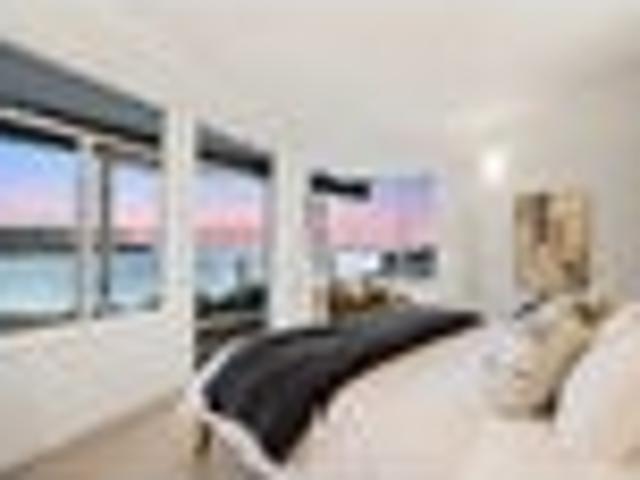 Coastal luxury with panoramic Langs Beach views
