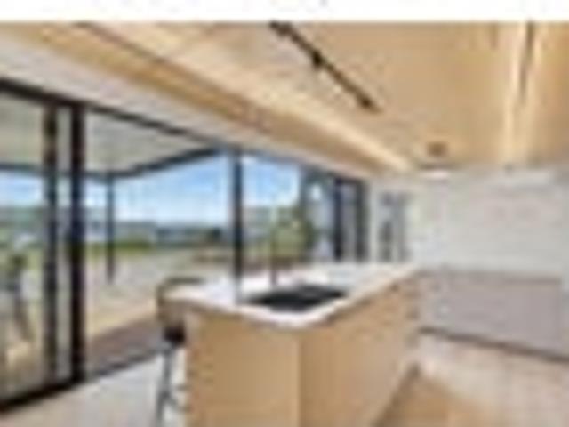 Coastal Living Framed by Greenery