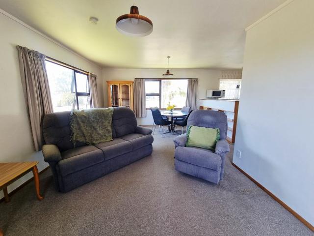 Coastal Living on Pohutukawa Ave 2 Bedroom Home just Steps from the Beach!