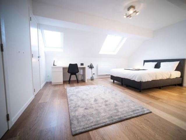 Coliving room with private bathroom shower and toilet