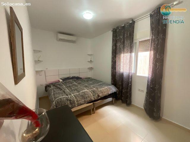 COQUETA VIVIENDA ADOSADA EN PLANTA BAJA CON AMPLIA PARCELA Y PISCINA COMUNITARIA