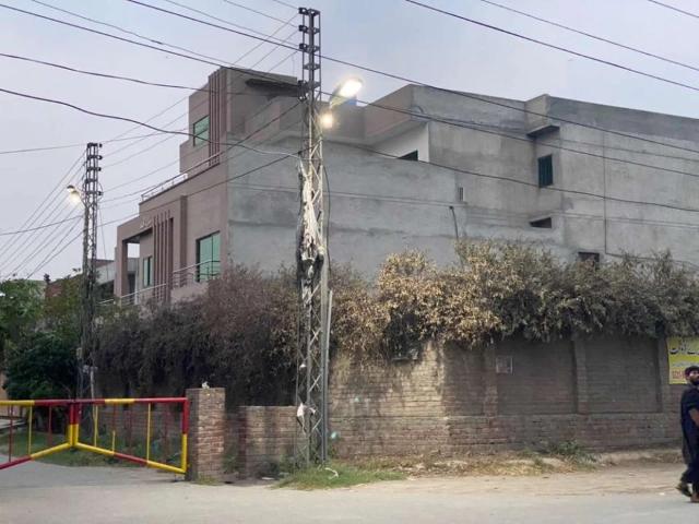 Corner 10 marla semi commecial plot available for sale Lahore Marghzar Officers Colony ID 06364