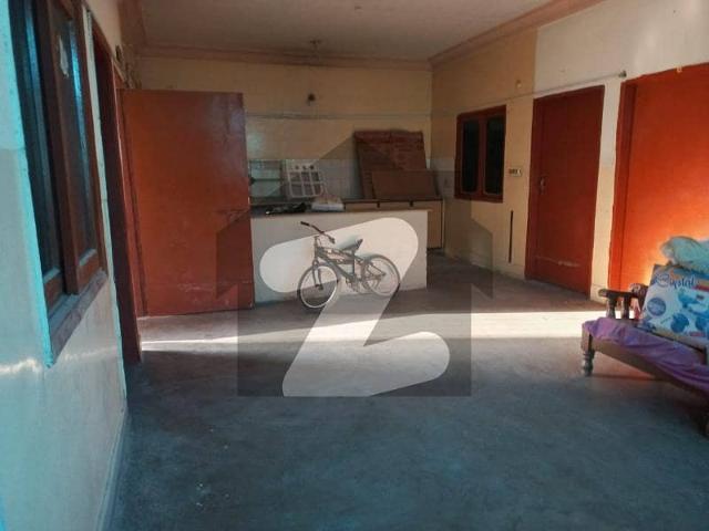 Corner House For Sale Used For Commercial Purposes Has Five Shops Inside