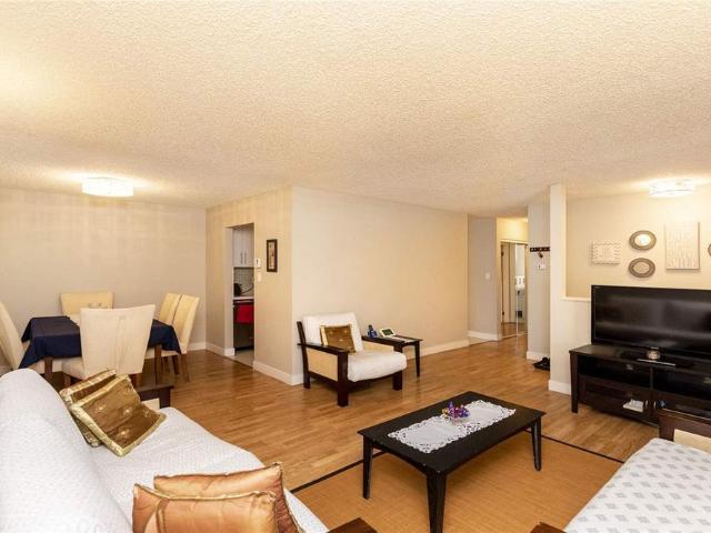Corner Unit Lower Floor Townhome in Newton One Park – Prime Location!