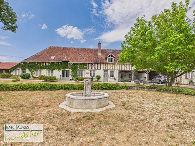 Corps de ferme avec jardin