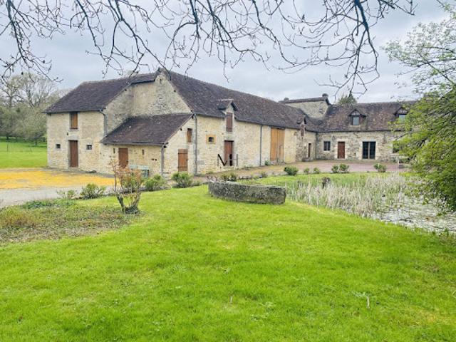 Corps de ferme avec jardin